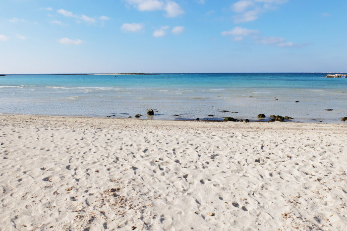 The sandy beach of Torre Sant’Isidoro in Puglia